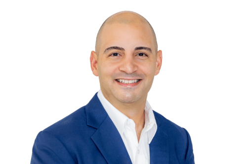 A photo of Dr. Jonathan Clavell smiling.
